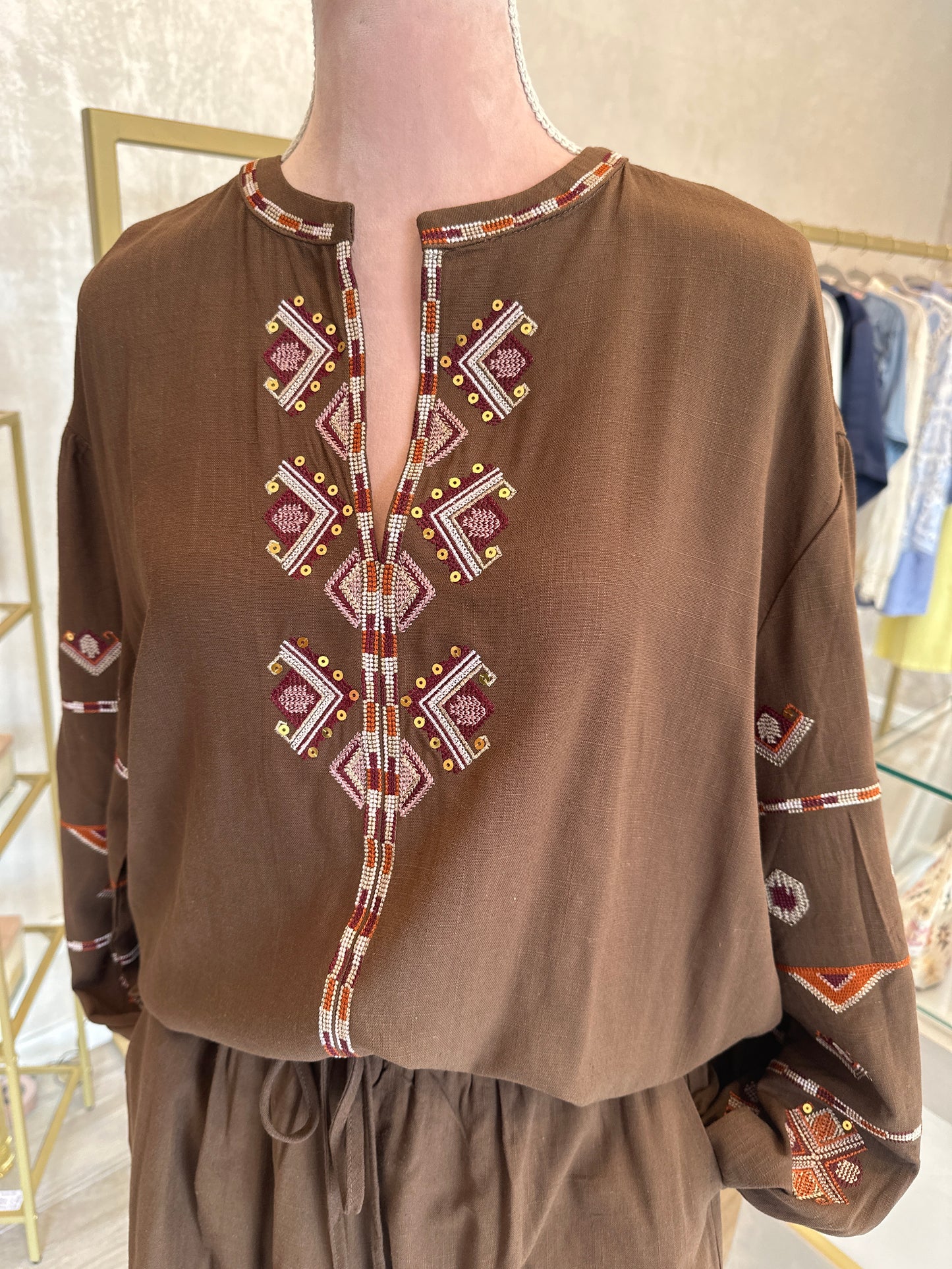 Blusa con racami