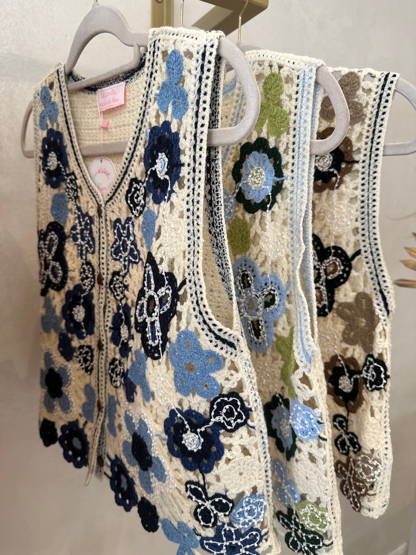 Gilet con ricami blu