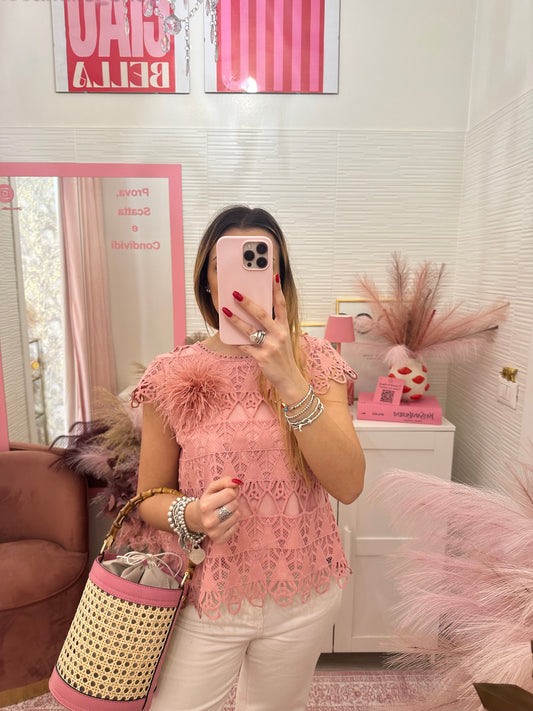 Blusa con ricami