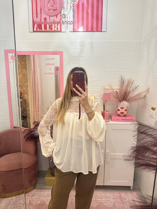 Blusa con dettagli in pizzo